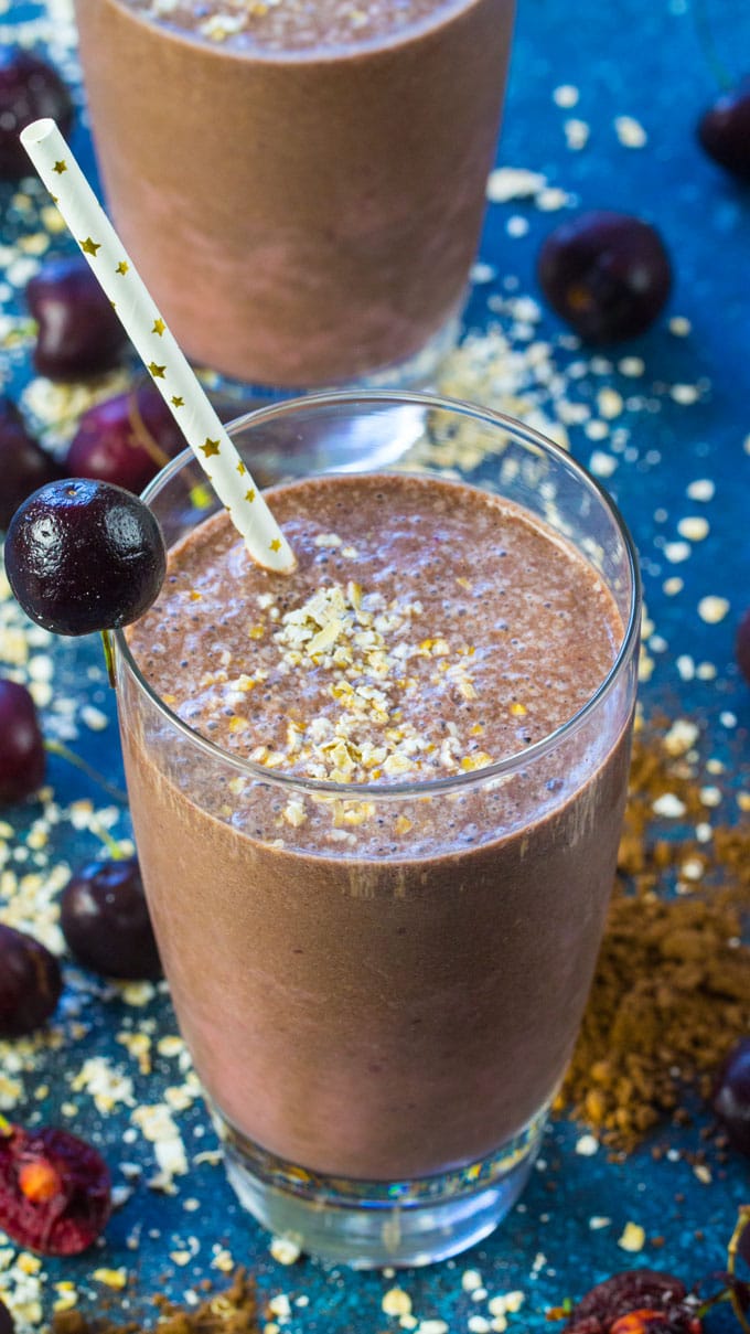 Chocolate Cherry Smoothie is a delicious combo of sweet, tart, creamy and chocolaty in a healthy drink that tastes like an indulgent dessert. Vegan and gluten free, extra filling with oats blended in. Perfect for breakfast or post workout.