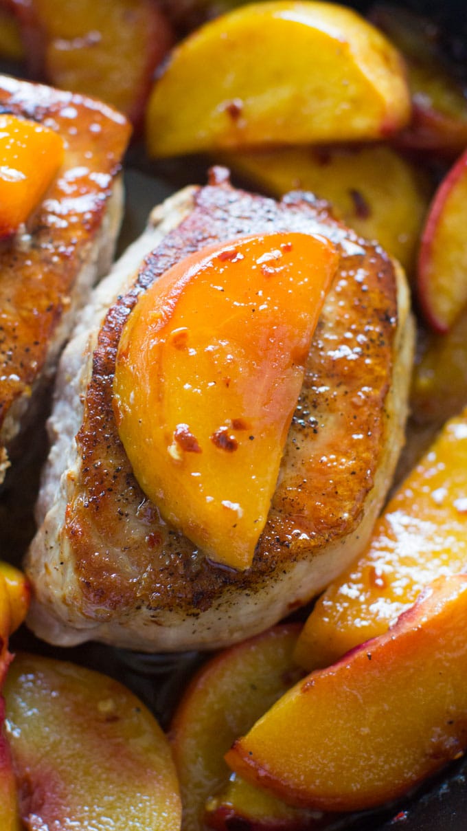 One Pan Peach Pork Chops are the perfect combination of sweet and savory. Ready in just 30 minutes.