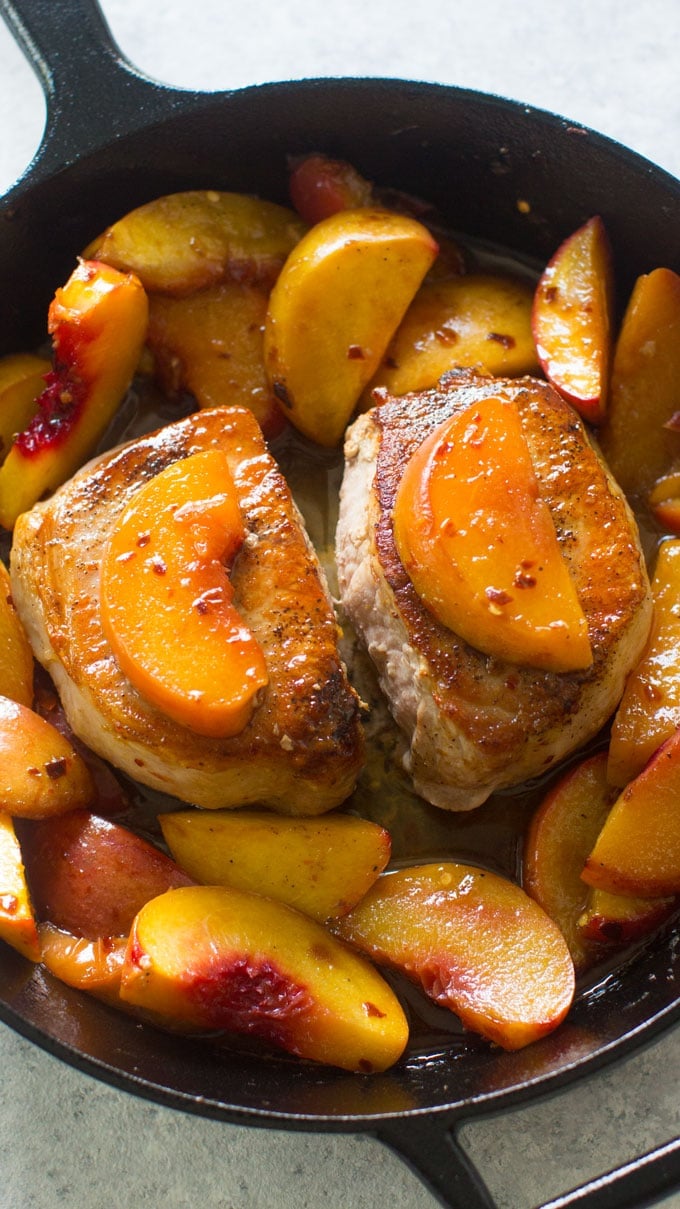 One Pan Peach Pork Chops are the perfect combination of sweet and savory. An easy and beautiful meal, ready in just 30 minutes.