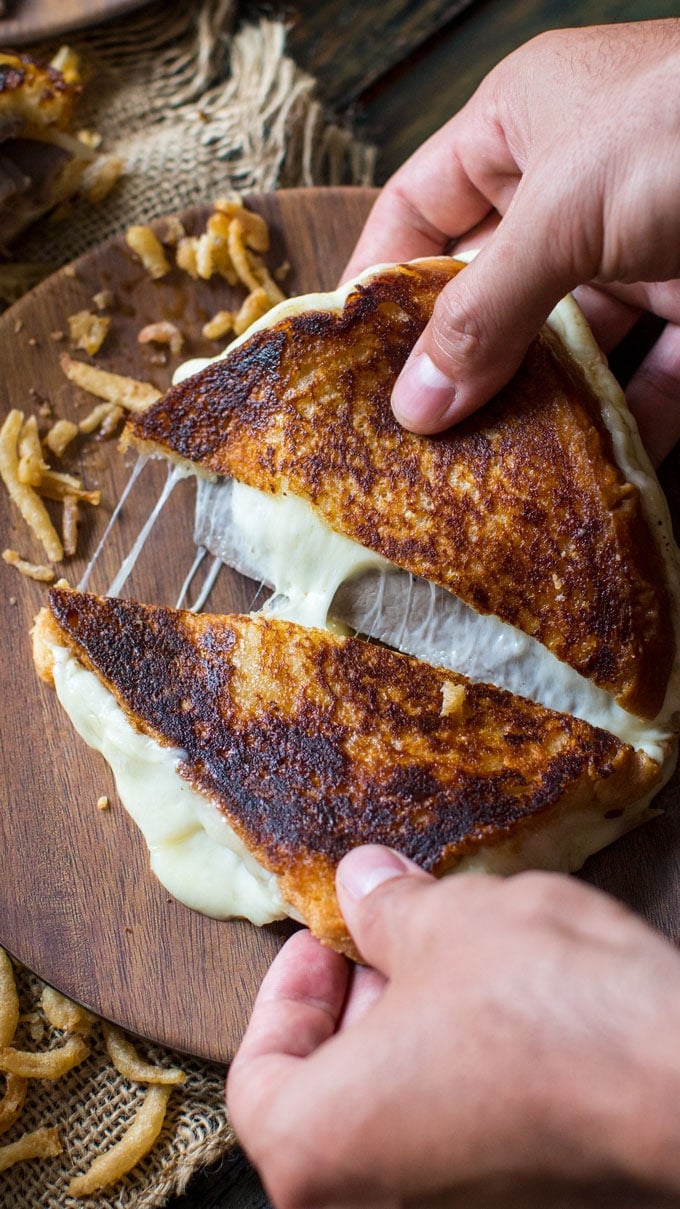 French Dip Grilled Cheese Sandwich is perfect for dinner, parties or game nights! Serve with the dipping sauce on the side and french fried onions.