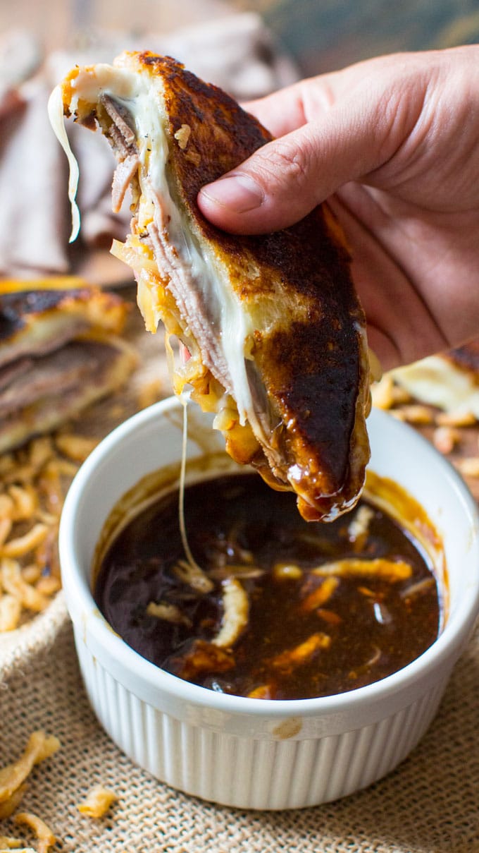 The BEST French Dip Grilled Cheese Sandwich is perfect for dinner, parties or game nights! Serve with the dipping sauce on the side and french fried onions for a nice crunch.