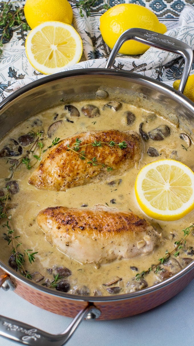 Creamy Lemon Thyme Chicken is made with white wine, lemon zest, cream, mushrooms and thyme. Made in one pan in just 30 minutes.