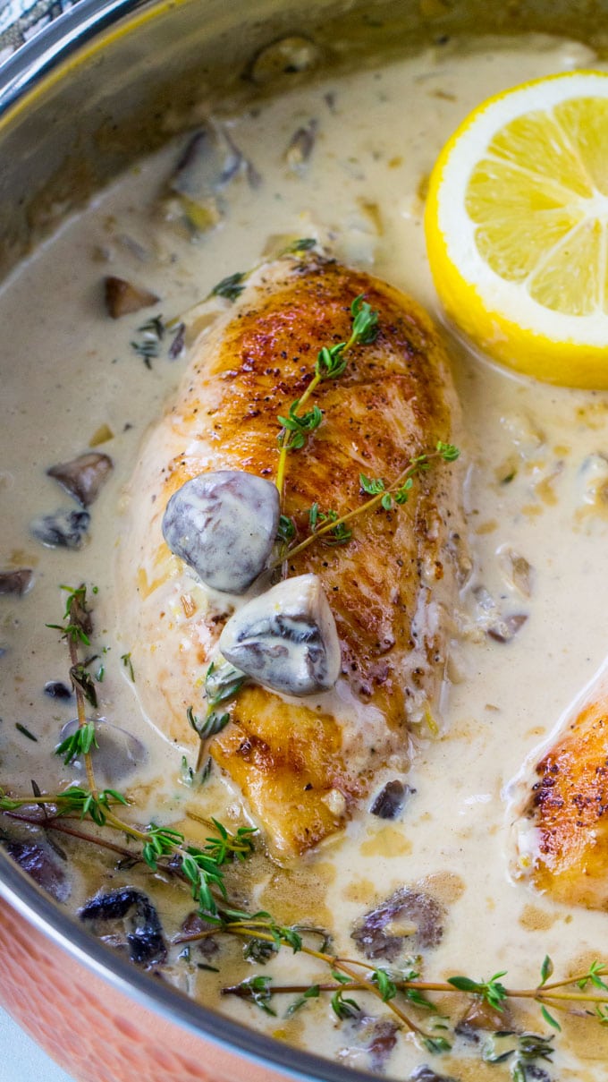 Lemon Thyme Chicken is creamy and fragrant, made with white wine, lemon zest, cream, mushrooms and thyme. Made in one pan in just 30 minutes.