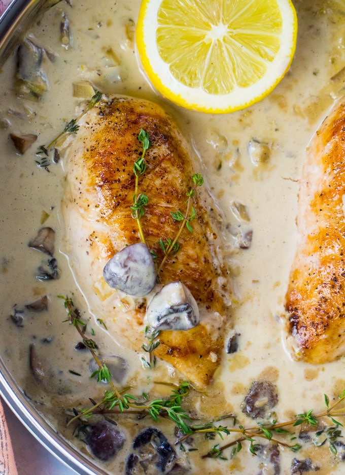 One Pan Creamy Lemon Thyme Chicken is made with white wine, lemon zest, cream, mushrooms and thyme. Ready in just 30 minutes.