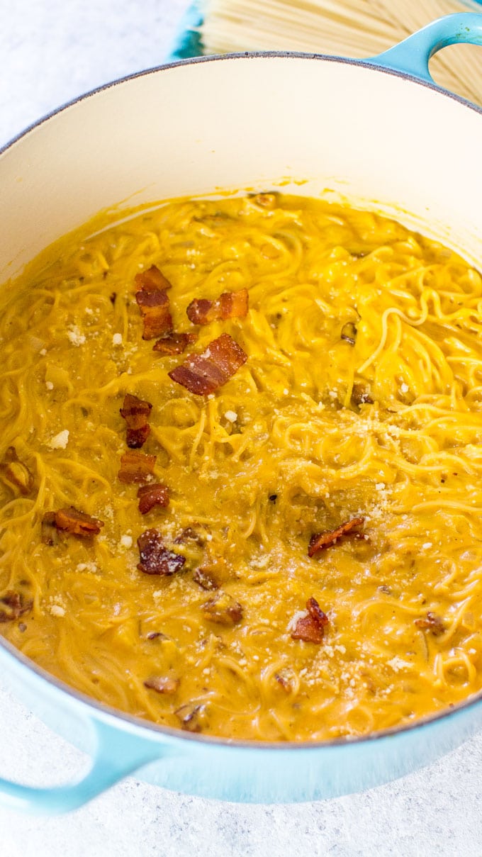 Pumpkin Pasta is creamy and delicious, easily made in one pot in 30 minutes or less. Topped with perfectly cooked bacon for a savory finish.