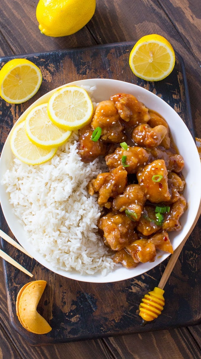 Crispy Honey Lemon Chicken is a restaurant quality meal, that can be made at home in just 30 minutes! Crispy, sticky and full of honey lemon flavor.