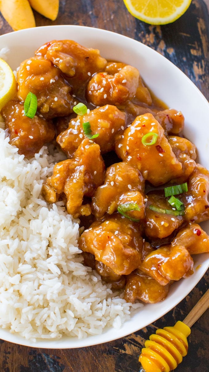 Crispy Honey Lemon Chicken is a restaurant quality meal, made easy at home in just 30 minutes in one pan! Crispy, sticky and full of honey lemon flavor.