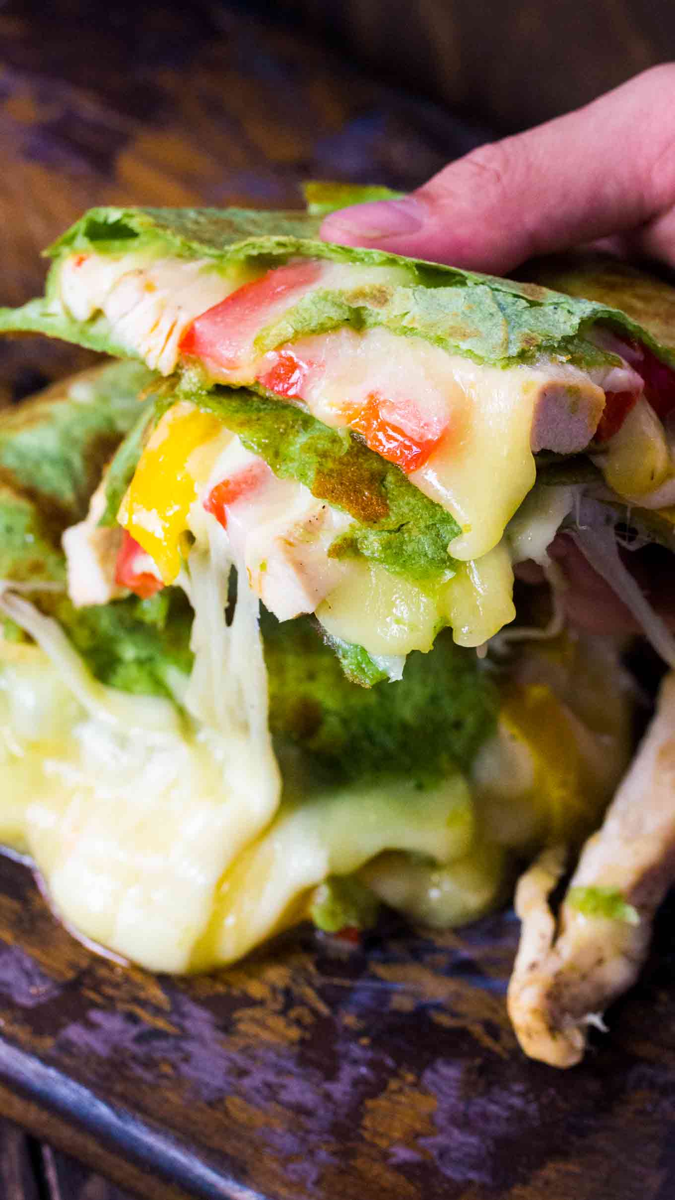 Cheesy Skillet Chicken Fajita Quesadilla is loaded with juicy and tender chicken meat, crunchy bell peppers and lots of delicious, melting cheese.