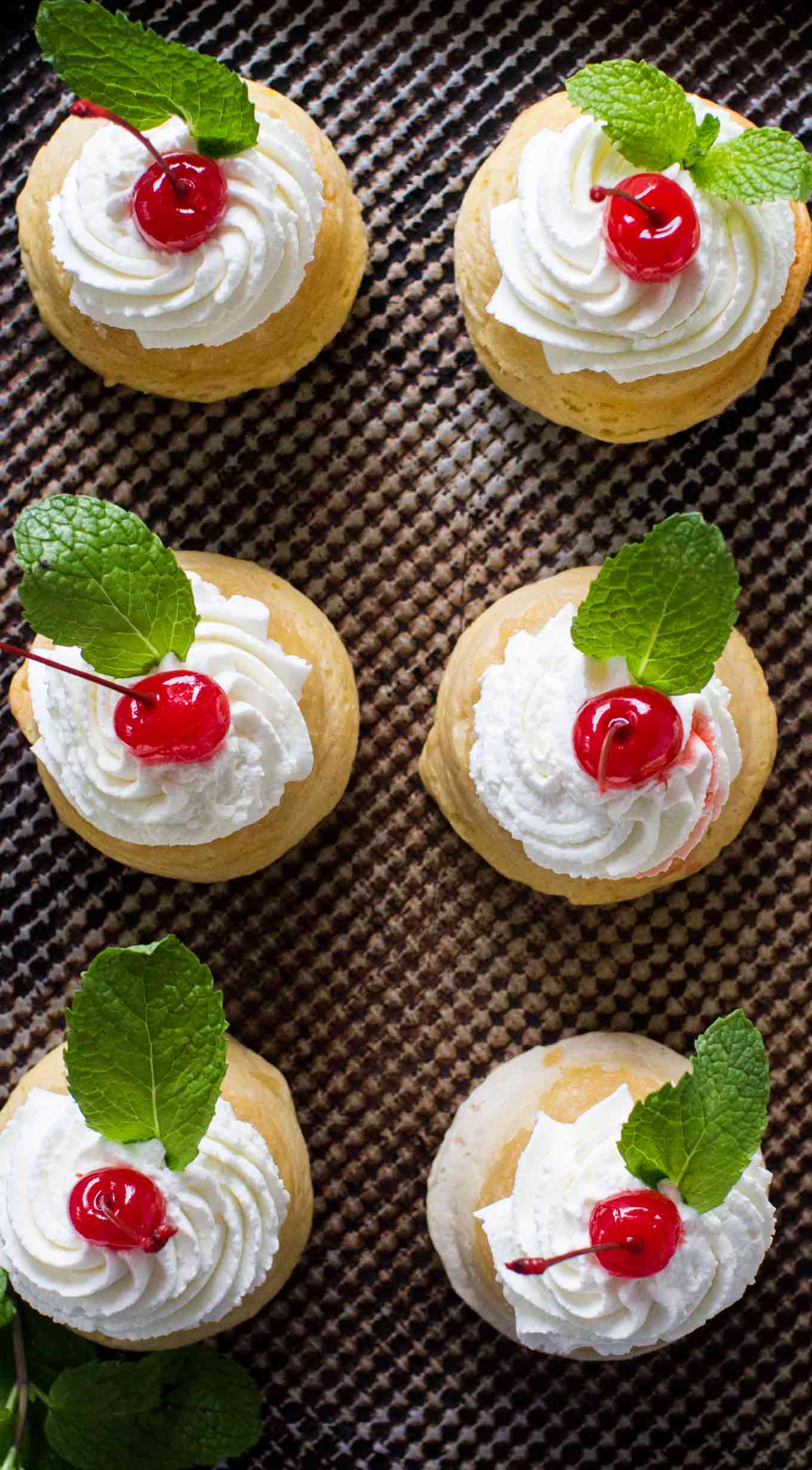 Easy Pineapple Upside Down Cakes turns making dessert into a fun task! These cakes are made with biscuit dough and are ready in 30 minutes!