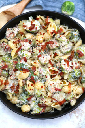 Brussels Sprouts in Alfredo Sauce Pasta is a creamy, buttery, and cheesy meal that is ready in about 30 minutes. #pasta #pastadinner #30minutemeals #brusselssprouts #dinnerideas