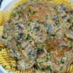 Cast Iron Chicken and Mushroom is an easy and flavorful meal that is made with just a few ingredients in one pan. #chicken #castiron #30minutemeals #dinnerideas #mushrooms