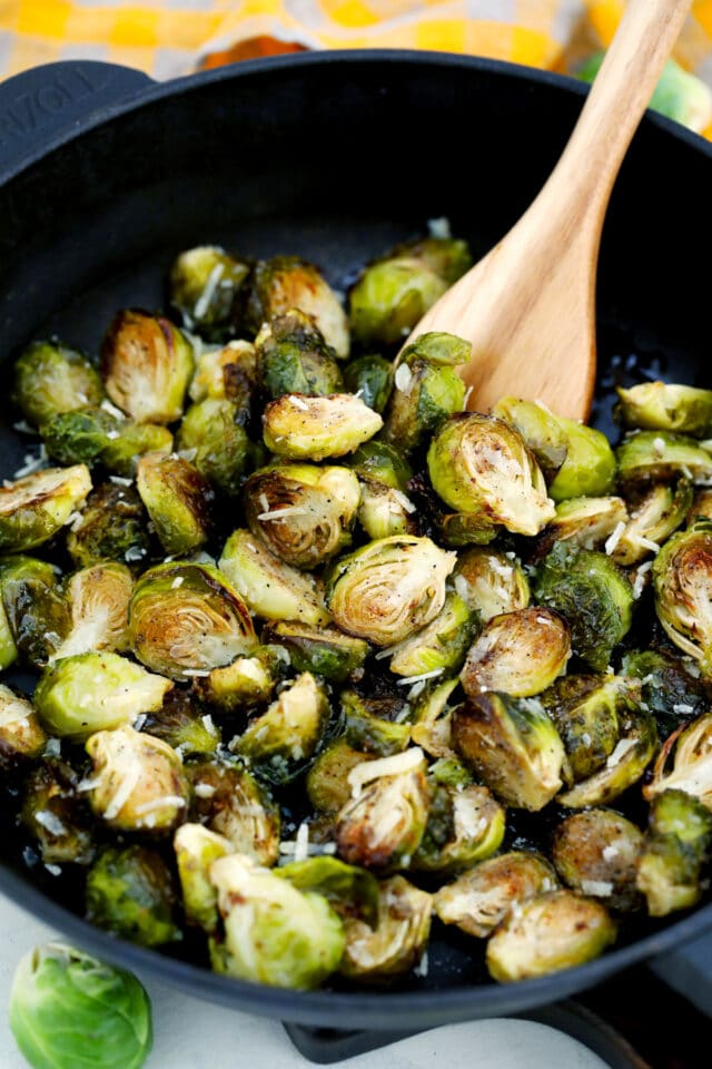 Fried Brussels Sprouts recipe is easy to make with only a few ingredients, and ready in less than 30 minutes. #brusselssprouts #sidedish #thanksgiving #vegetarianrecipes #sweetandsavorymeals