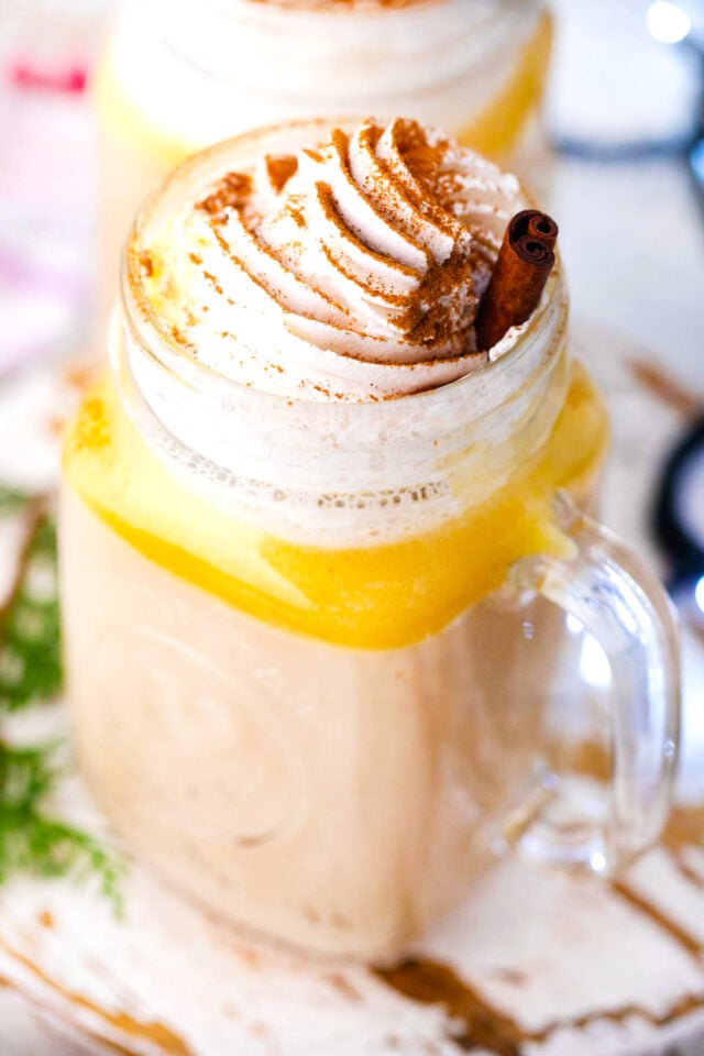 Homemade spiced buttered rum with cinnamon whipped cream.