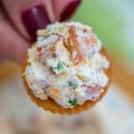 Cheddar Ranch Cheese Ball is the perfect Holiday appetizer made of cheddar cheese, ranch seasoning, and obviously bacon! #cheeseball #cheese #30minutemeals #appetizers #partyfood