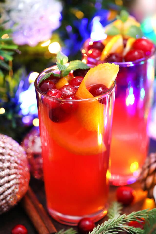 Christmas Punch is made with fresh cranberries, various juices, and sparkling water. #christmaspunch #christmasrecipes #drinks #30minutemeals #holidayrecipes