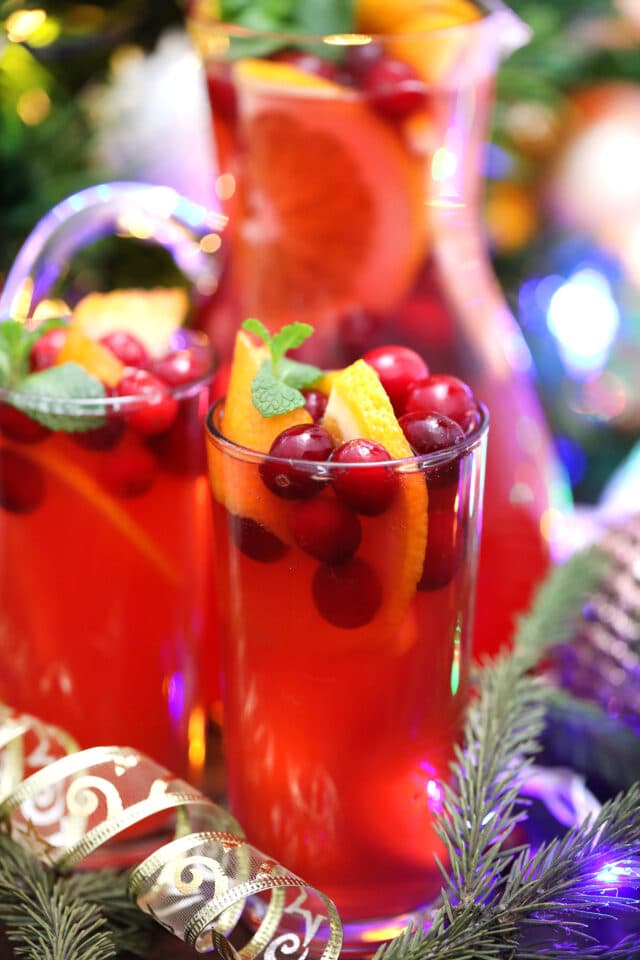 Christmas Punch is made with fresh cranberries, various juices, and sparkling water. #christmaspunch #christmasrecipes #drinks #30minutemeals #holidayrecipes