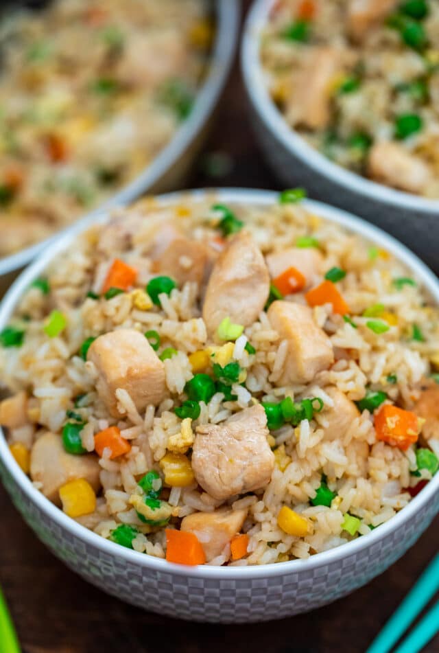 Chicken Fried Rice is an easy, one-skillet recipe that is ready in less than 30 minutes and tastes better than takeout! #friedrice #chickenfoodrecipes #30minutemeals #chickenrecipes #chinesefood