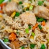 Chicken Fried Rice is an easy, one-skillet recipe that is ready in less than 30 minutes and tastes better than takeout! #friedrice #chickenfoodrecipes #30minutemeals #chickenrecipes #chinesefood