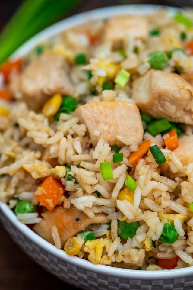Chicken Fried Rice is an easy, one-skillet recipe that is ready in less than 30 minutes and tastes better than takeout! #friedrice #chickenfoodrecipes #30minutemeals #chickenrecipes #chinesefood