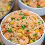 Shrimp Fried Rice recipe is made with fresh shrimp, rice, green onions, peas, carrots, and sesame oil. It is a classic dinner dish that is ready in about 30 minutes! #friedrice #shrimprecipes #30minutemeals #shrimpfriedrice #chineserecipes