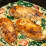 Creamy Tuscan Chicken is a one-pan recipe made with juicy seared chicken breasts soaked in the most delicious creamy sauce. #chickenrecipes #tuscanchicken #onepan #30minutemeals #chickenfoodrecipes