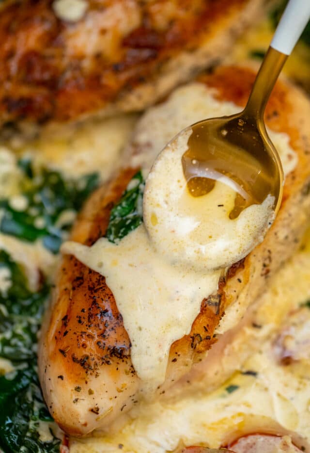 Creamy Tuscan Chicken is a one-pan recipe made with juicy seared chicken breasts soaked in the most delicious creamy sauce. #chickenrecipes #tuscanchicken #onepan #30minutemeals #chickenfoodrecipes