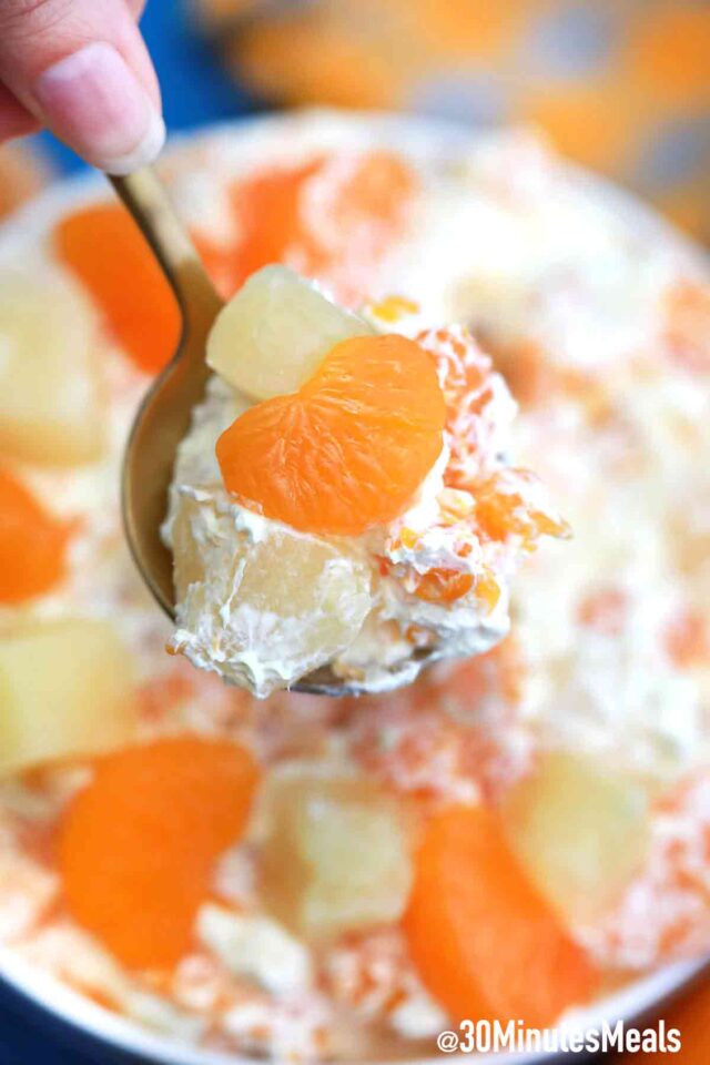 mandarin orange salad on a spoon