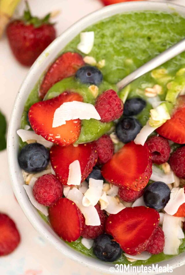 green smoothie bowl with strawberries