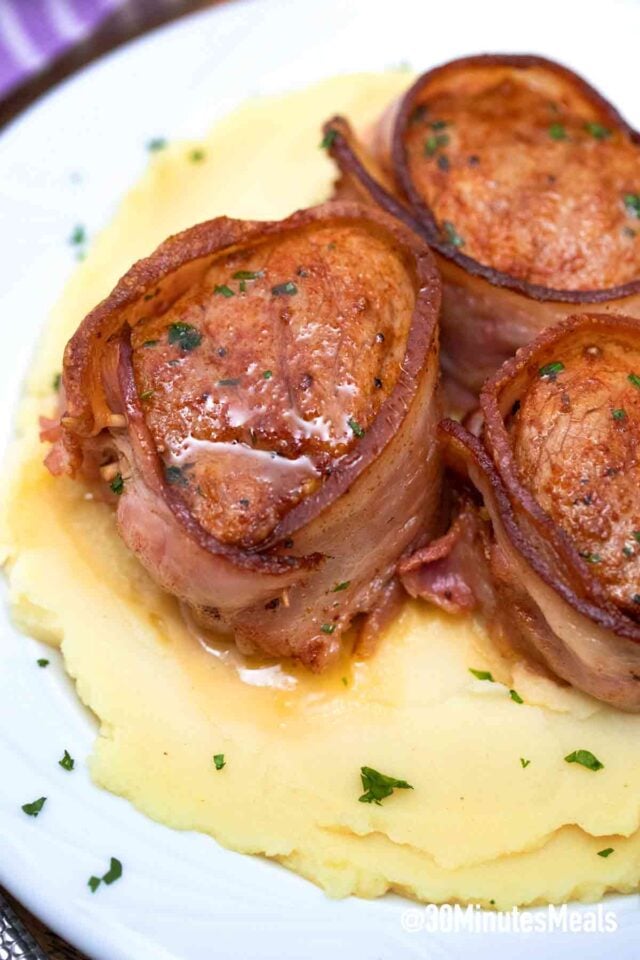 bacon three wrapped pork medallions