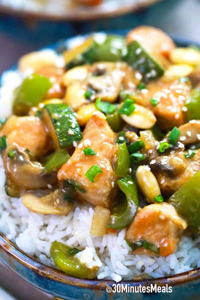 almond chicken on bowls with rice