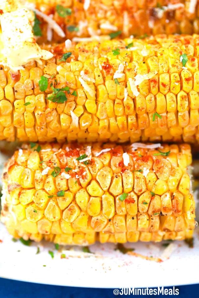 corn ears with butter paprika and parsley