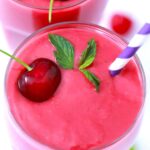 cherry smoothie with a fresh cherry