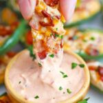 dipping air fryer jalapeno poppers in sauce