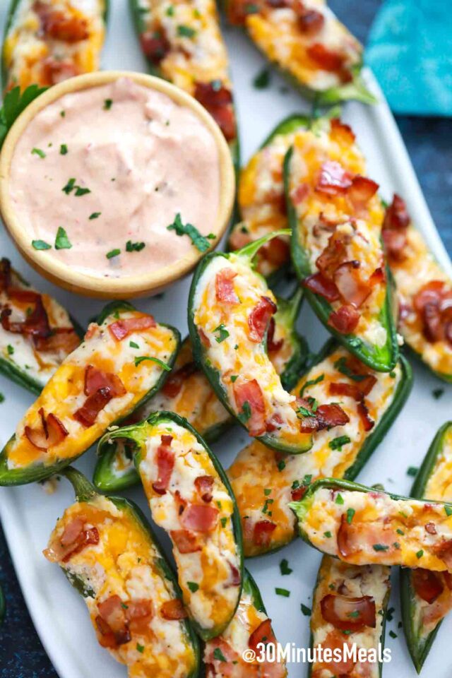 jalapeno poppers on a serving plate