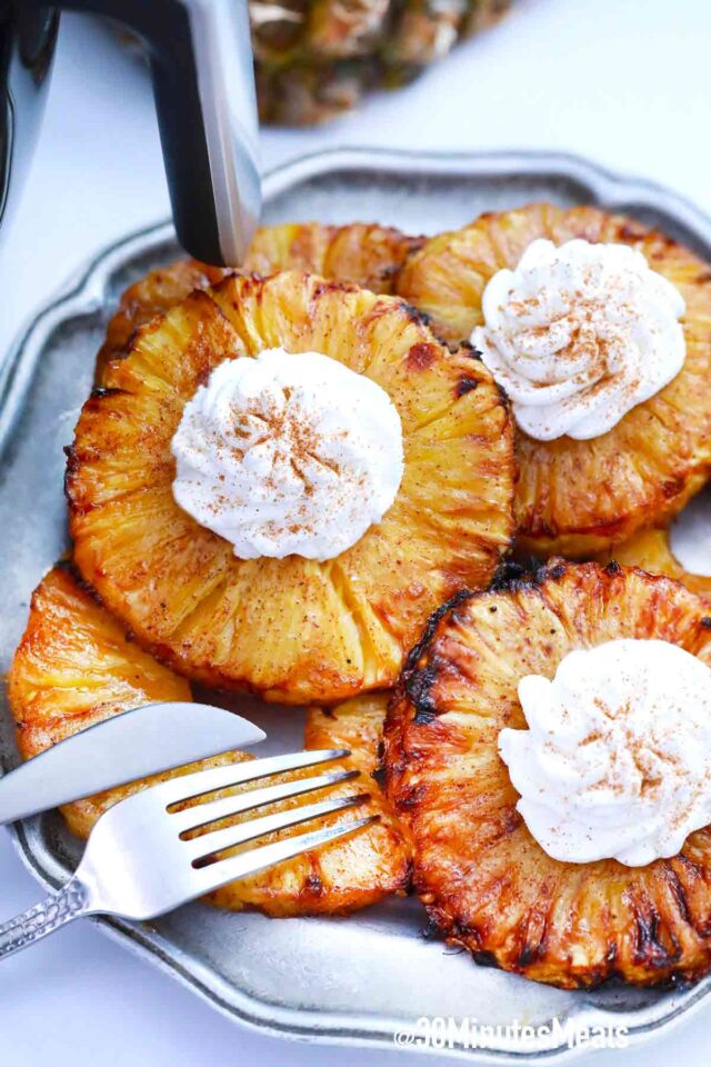 plate with browned pineapple rings