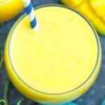 overhead shot of a glass with mango pineapple smoothie