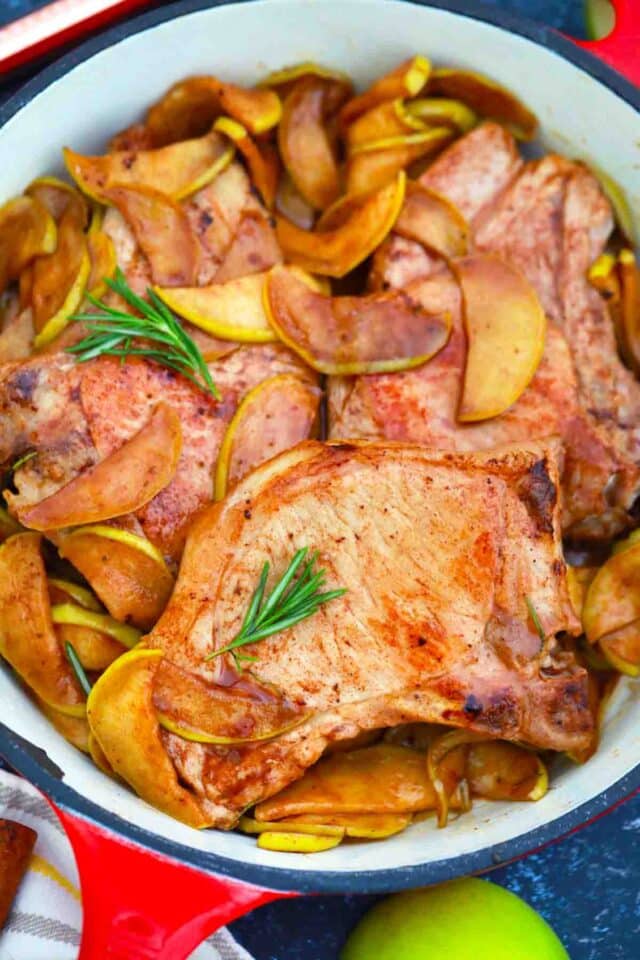 overhead shot of a pan with cinnamon apple pork chops