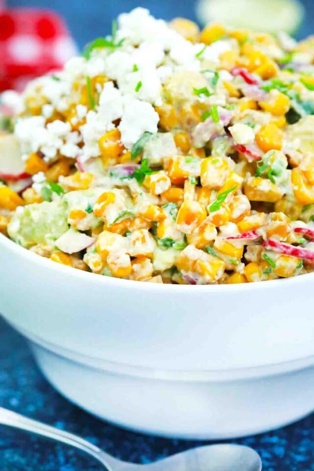 a bowl of creamy corn salad