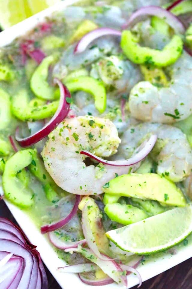 overhead shot of aguachile verde with raw shrimp