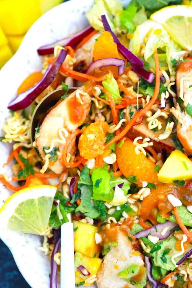 overhead shot of a bowl of tossed asian chicken salad