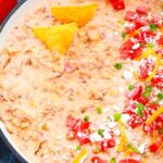 overhead photo of a skillet with velveeta sausage dip