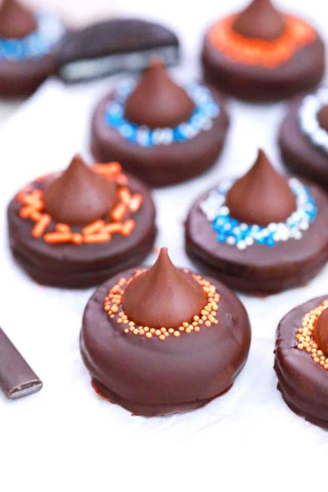 witch hat cookies on a white board