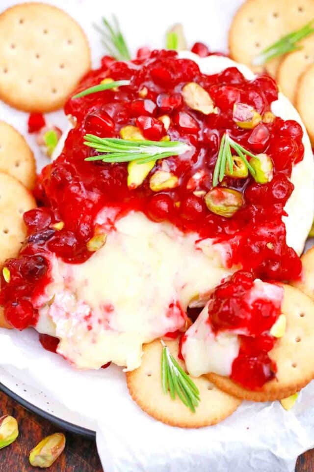 delicious cranberry baked brie with pomegranate seeds