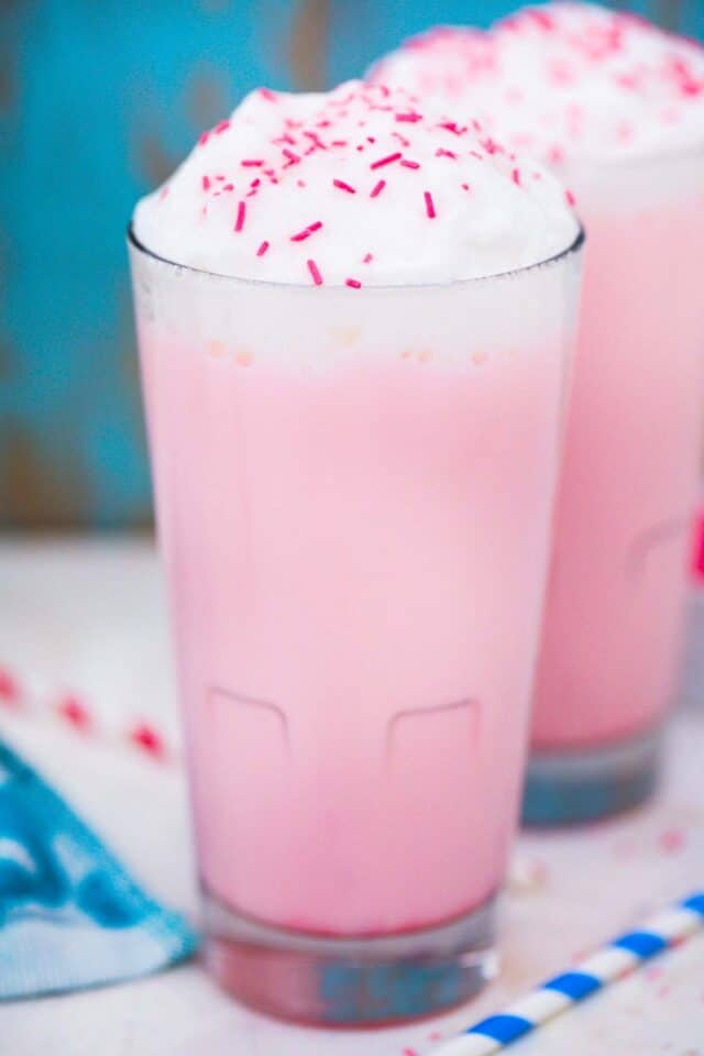 two tall glasses of pink angel milk