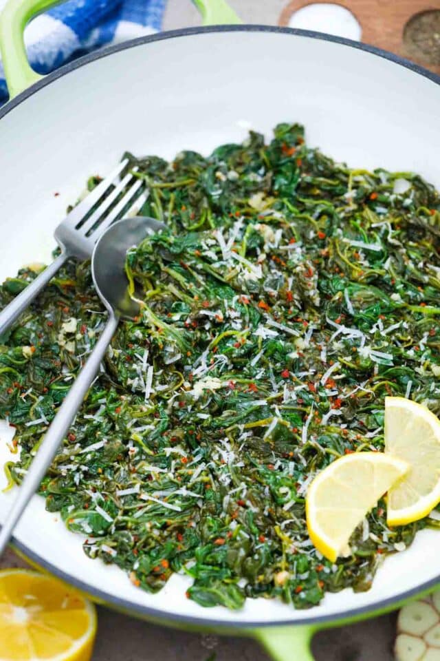 overhead shot of a pan with sauteed spinach