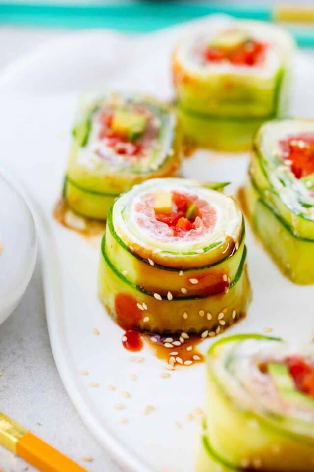 cucumber sushi roll cut into pieces and arranged on a plate