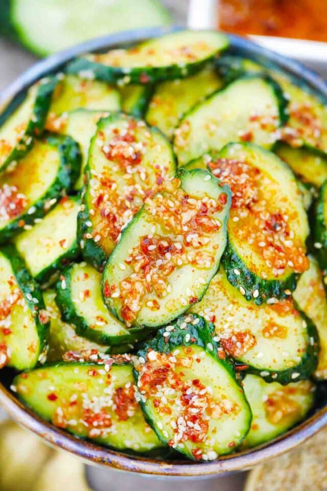 overhead shot of spicy asian cucumber salad with minced garlic