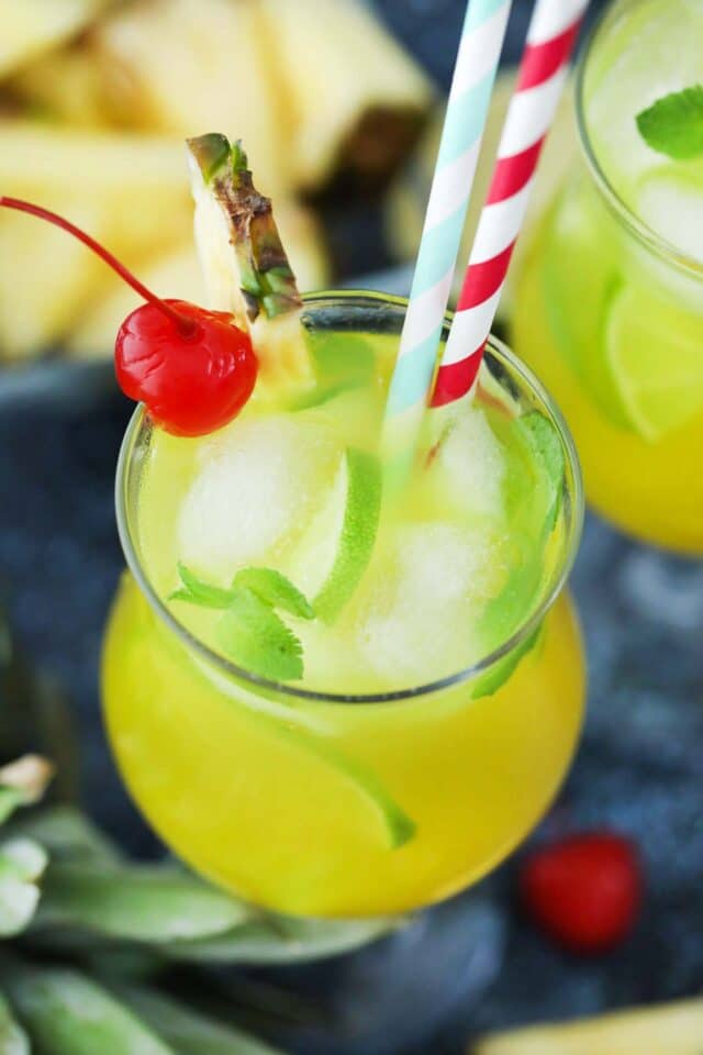 pineapple mojito with lime and ice cubes