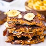 peanut butter date bark pieces stacked on top of each other