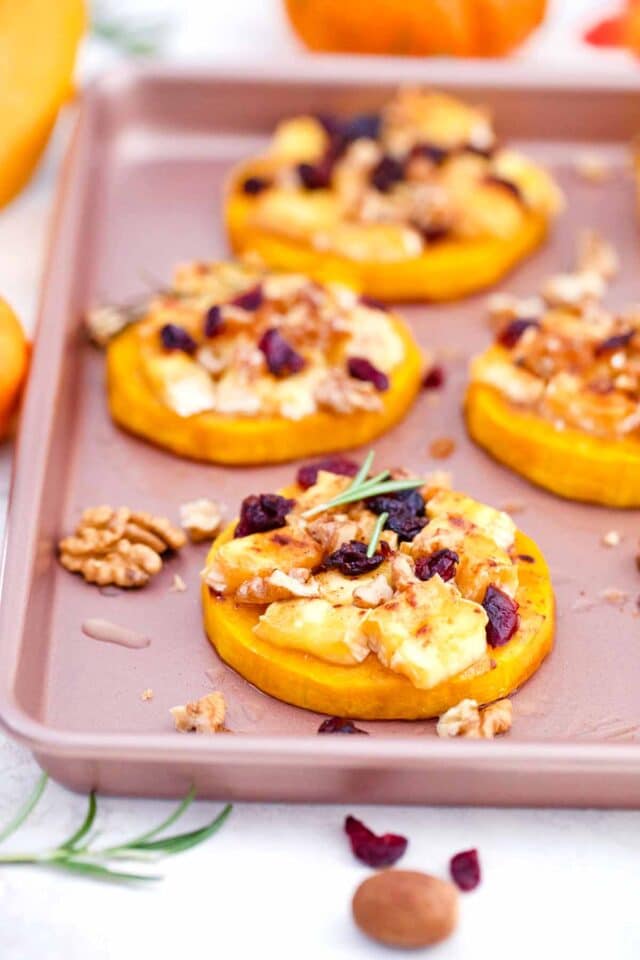 baked butternut squash brie rounds on a baking sheet
